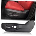Black driver-side seat trim bezel cover with molded switch controls and round dial