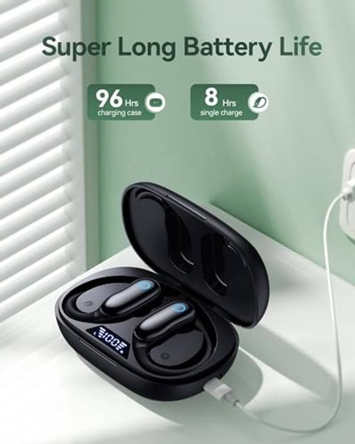 Black wireless earbuds in charging case, with cable connected for charging