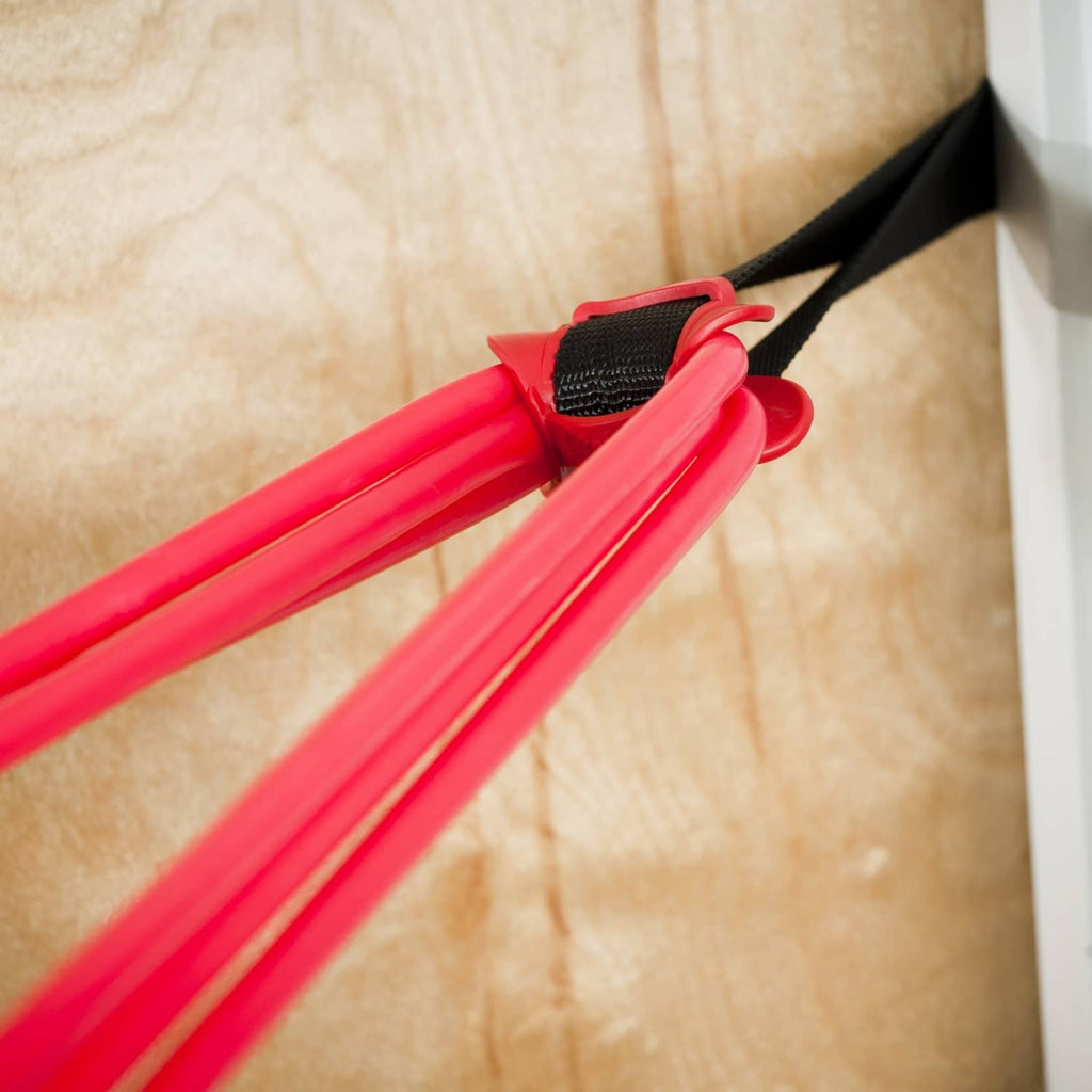 Door anchor strap and red clips attached near door edge