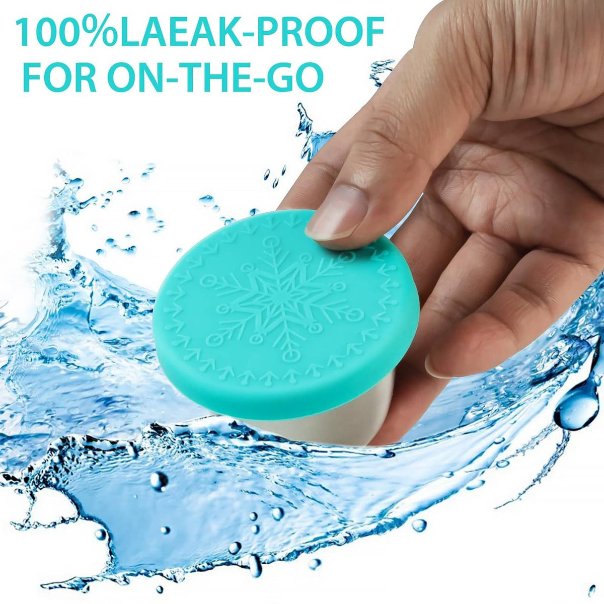 Reusable stainless steel dressing cup with teal leakproof silicone lid, hand pressing