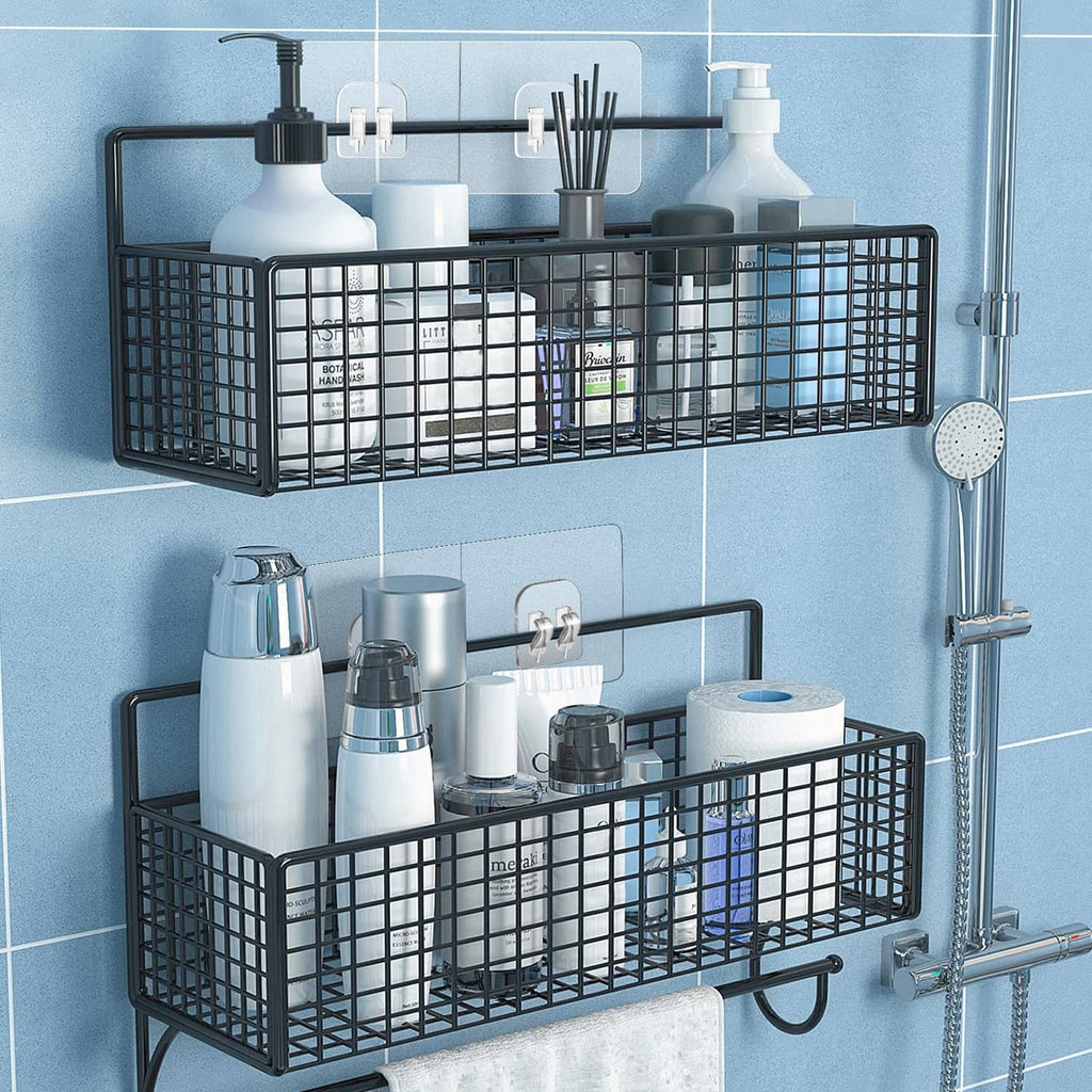 Black metal shower caddy with adhesive hooks holding toiletries on bathroom wall