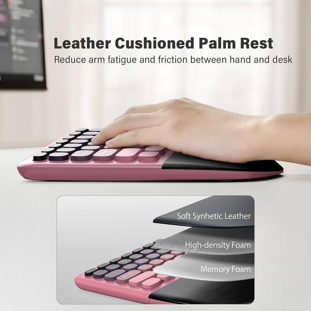 Pink wireless split keyboard with cushioned palm rest and wrist support pad