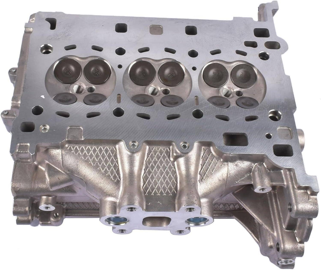 Engine cylinder head underside with coolant channels and valve spring seats, silver