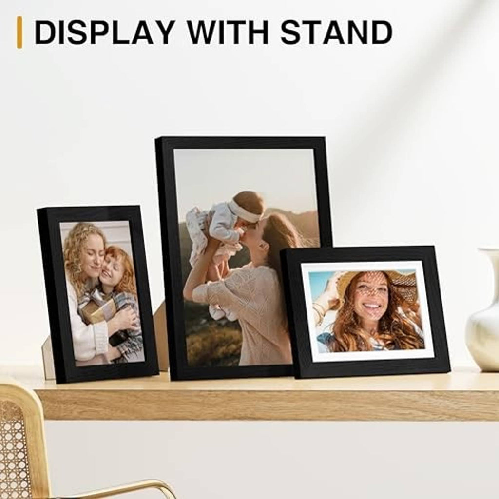 Black picture frames with built-in tabletop stand holding multiple photos