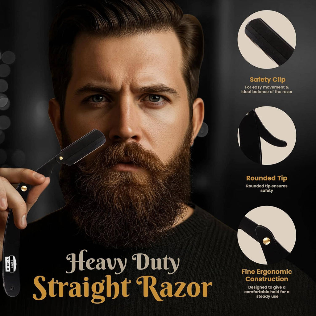 Beard grooming view: black straight razor with rounded tip and safety clip held up close.