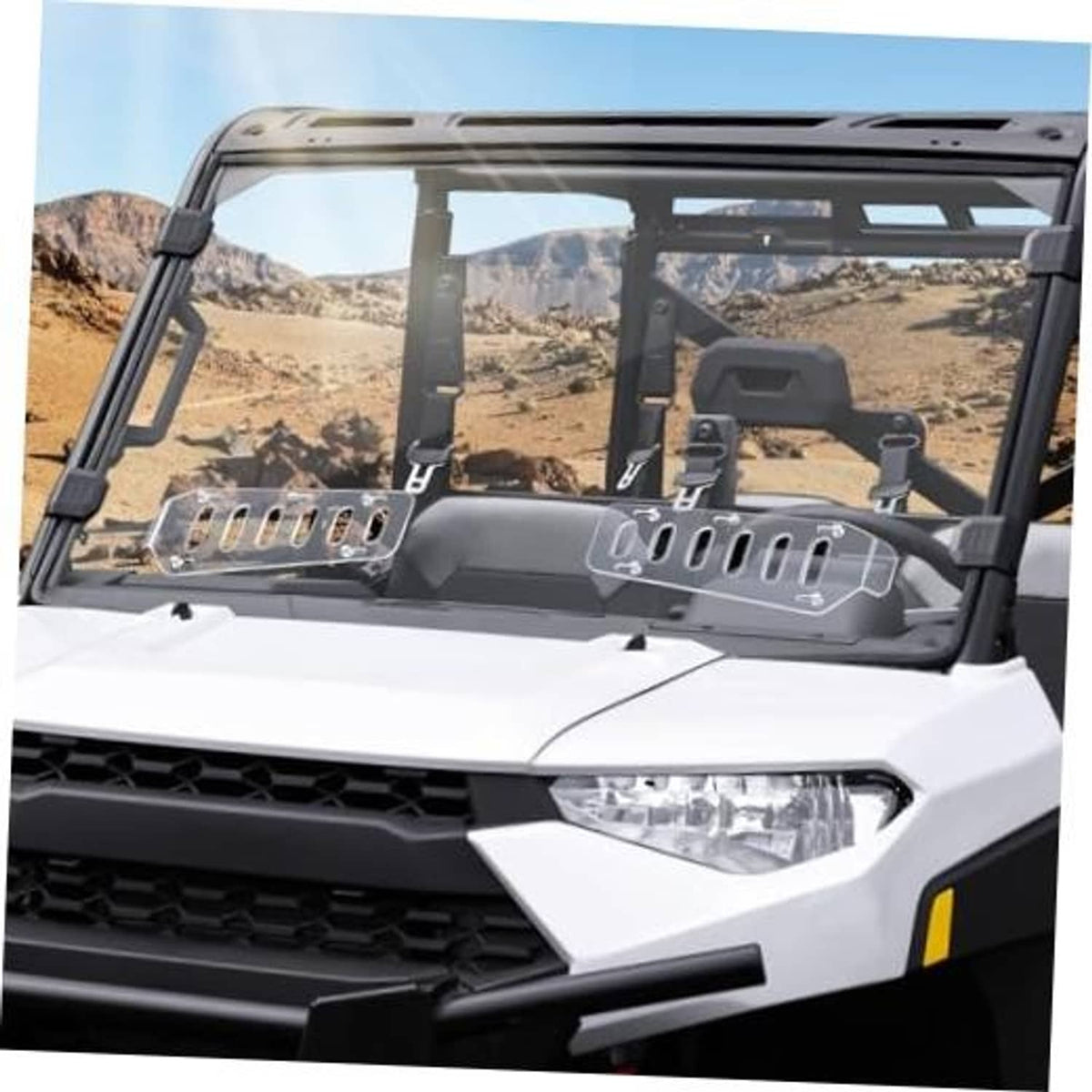 Vented clear windshield with dark mounting brackets for off-road UTV cab, front view.