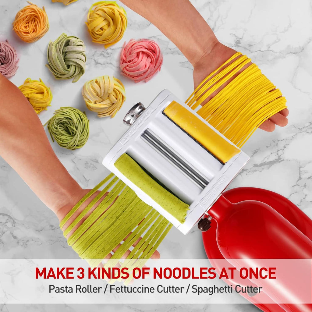 White pasta roller attachment with yellow, pink, green, and multicolor noodle sheets