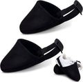 Pair of black bowling shoe slider sock covers with elastic strap, laid over white shoe