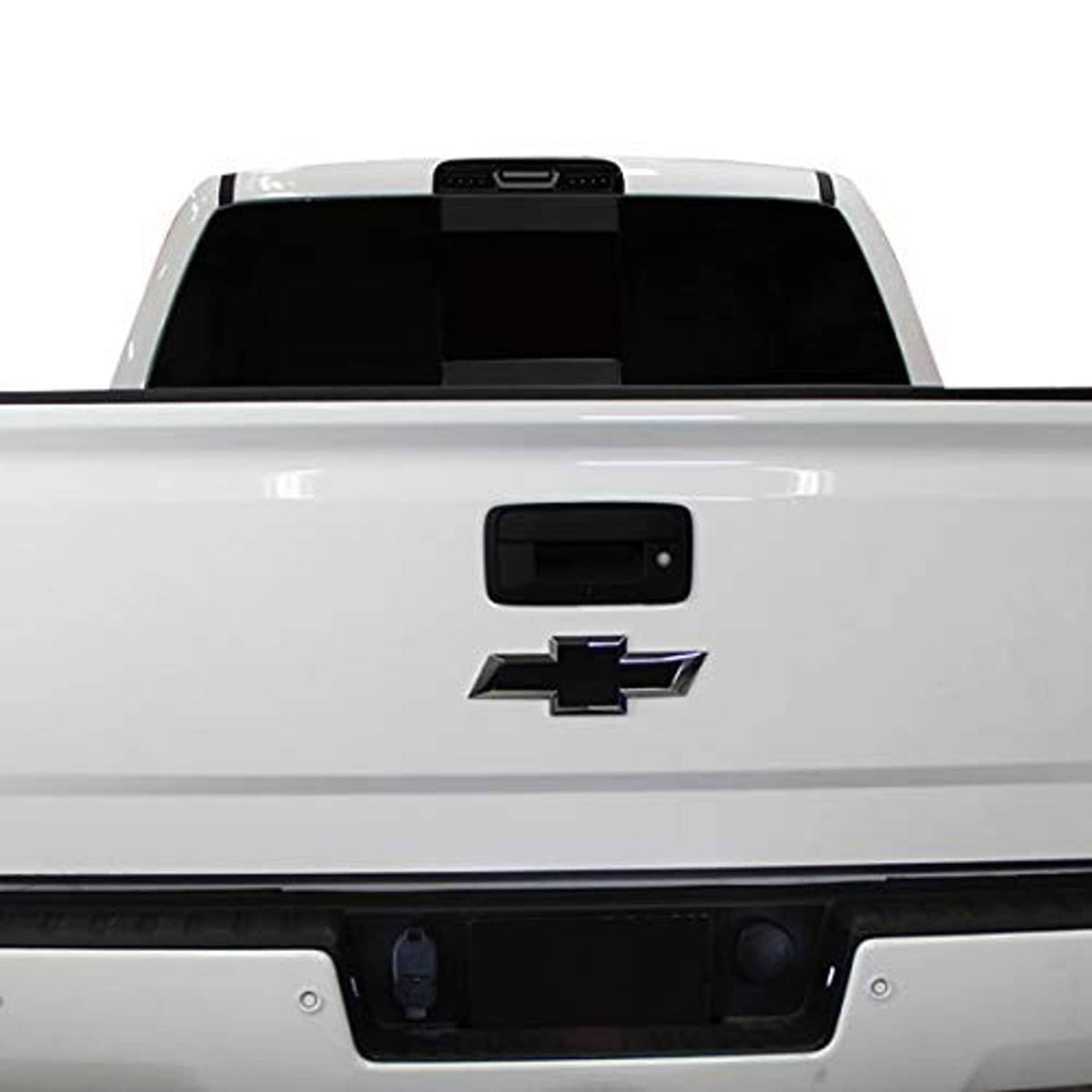 High mount brake light installed on a pickup tailgate with black smoke housing