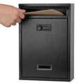 Black metal wall mailbox with combination lock keypad; hand opens top mail flap
