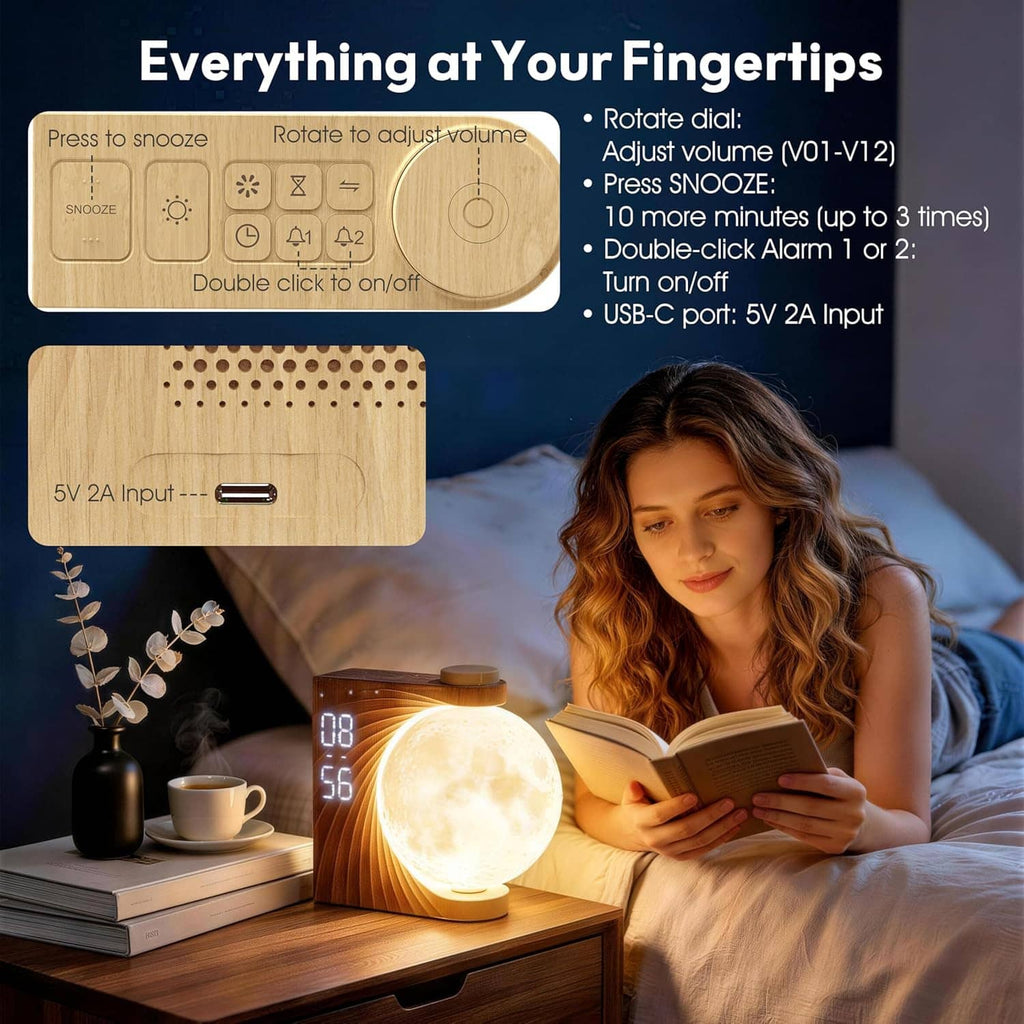 Moon alarm clock with round glowing moon and control panel buttons on side