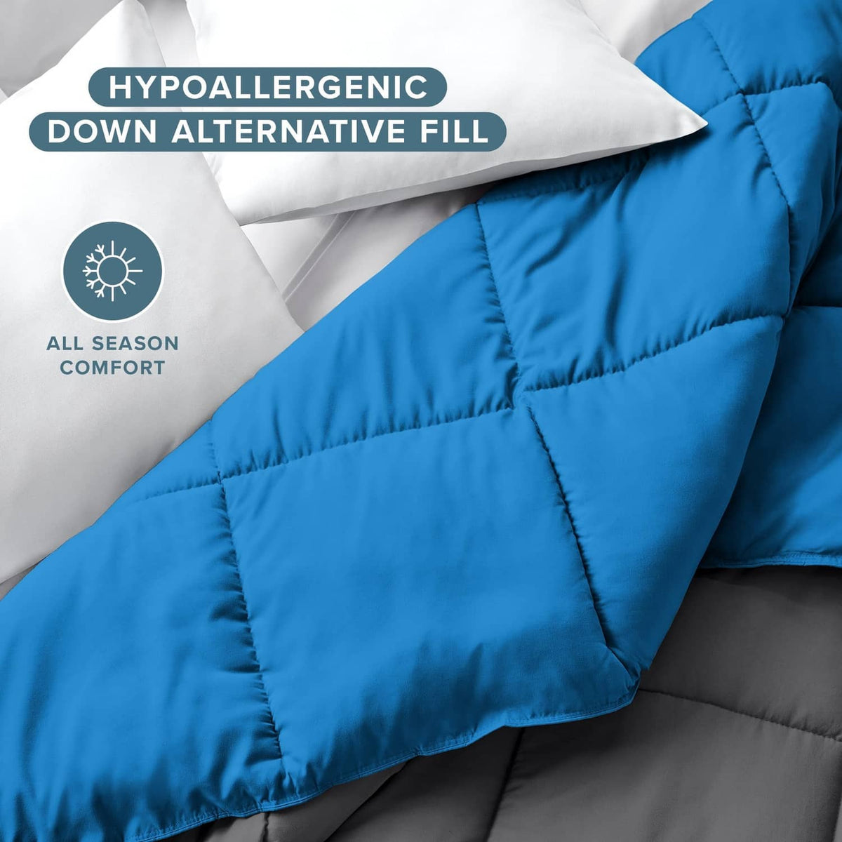 Close-up of blue reversible comforter with grey backing and box stitching