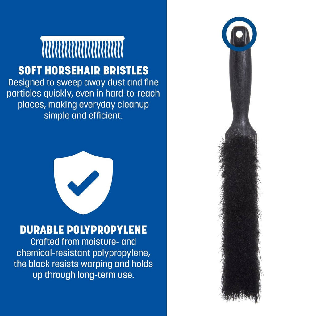 Black counter brush on package with soft bristles and curved handle