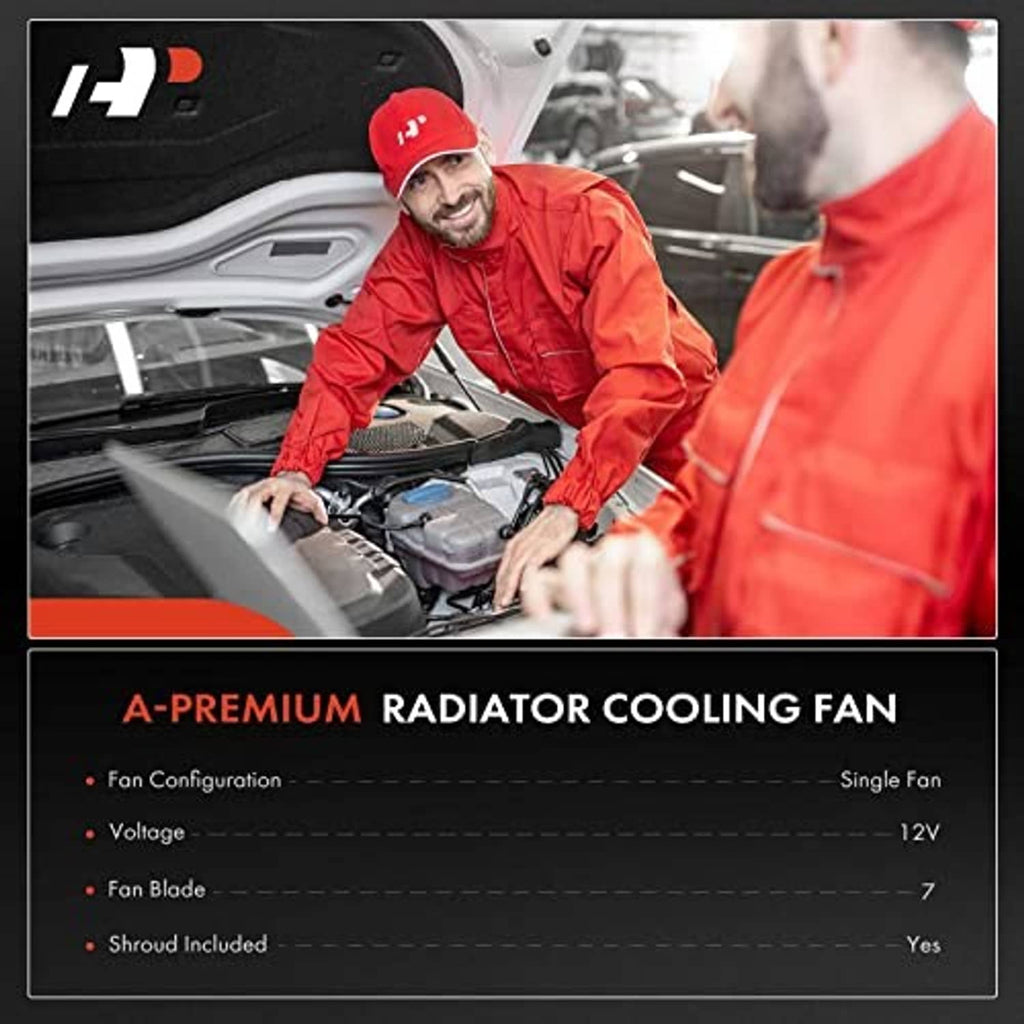 Radiator cooling fan assembly shown with technician under the vehicle hood