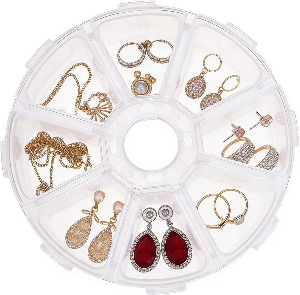 Clear round jewelry storage organizer filled with gold-tone and red earrings