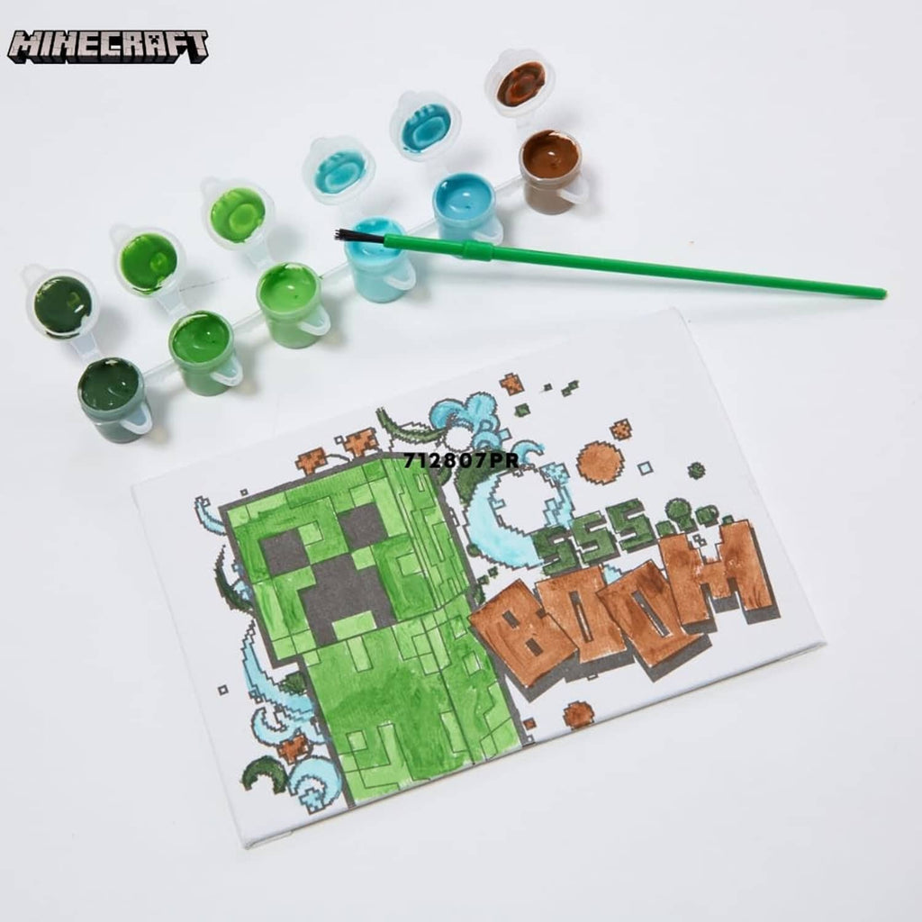 Minecraft canvas artwork with paint pots and green paintbrush laid next to it