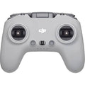 Grey FPV remote controller with two circular thumb joysticks and power button
