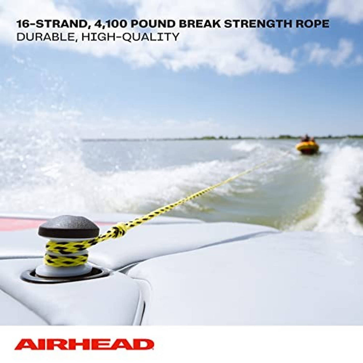 Braided yellow tow rope with deck-mounted cleat and coiled line