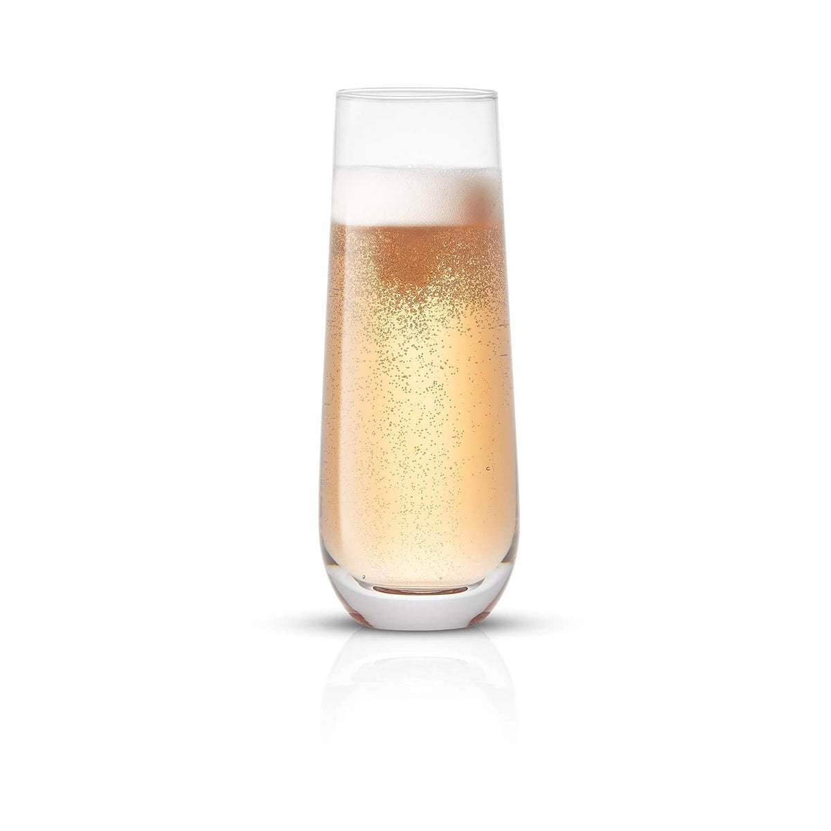 Stemless champagne flute, clear glass with golden bubbly drink and foam