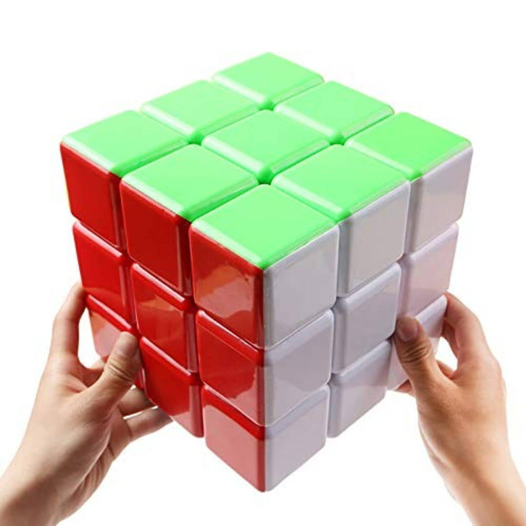 Stickerless 3x3 speed cube with green top, red side, and white base.