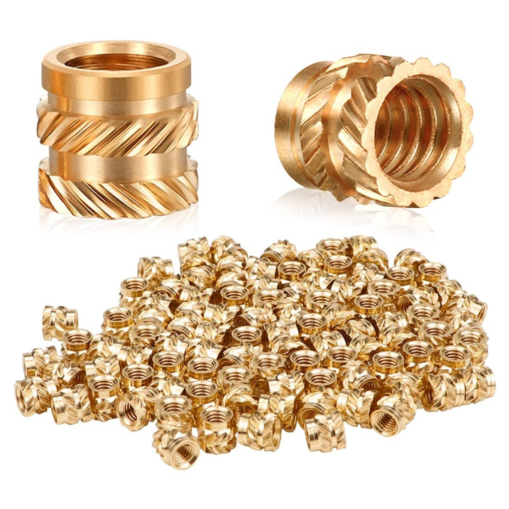 Brass knurled threaded heat-set insert nuts with flanged heads, close-up angles