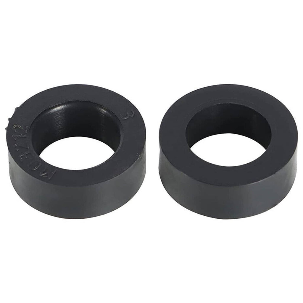 Two black rubber sway bar link bushings with round center holes