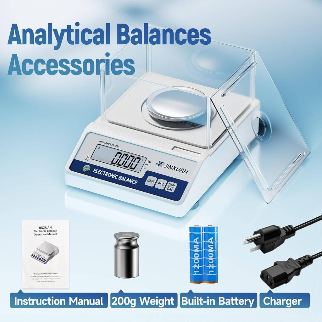 Analytical balance scale with clear glass chamber plus accessories including weight and cables