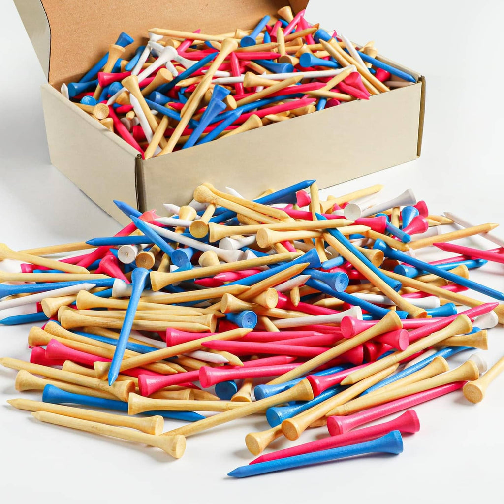 Mixed-color wooden golf tees in bulk, shown loose in a cardboard box