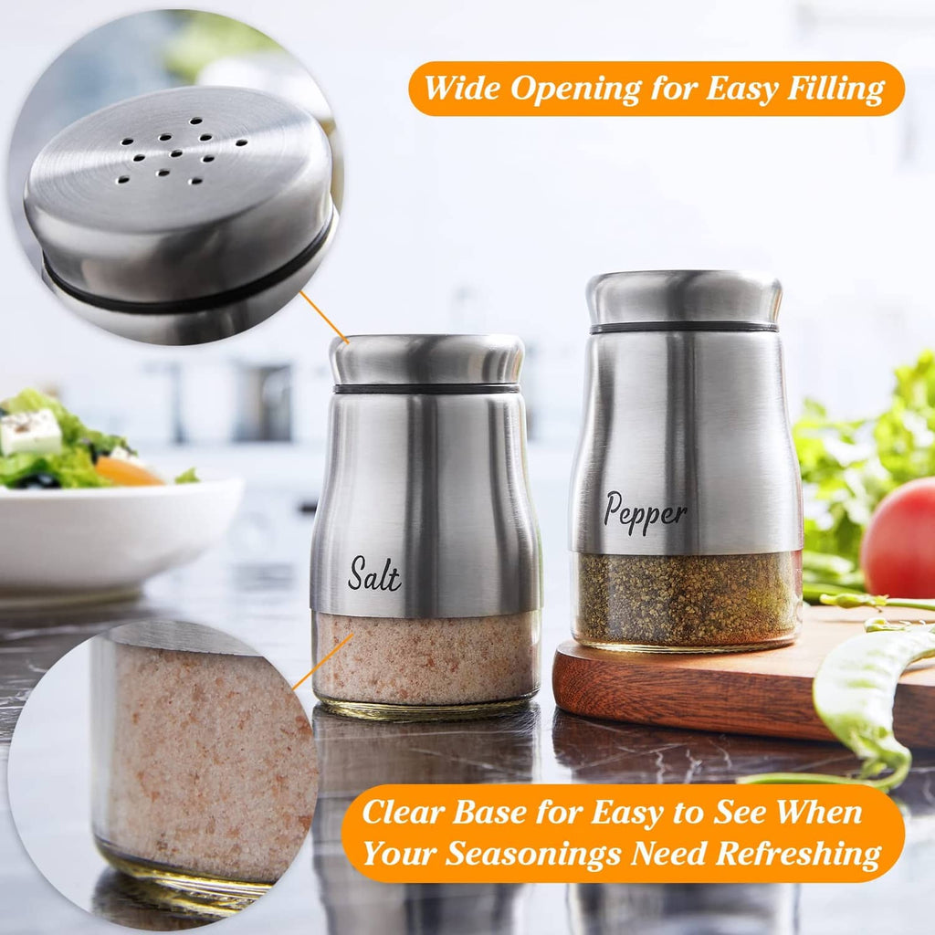 Stainless steel salt and pepper shakers with shaker tops and seasoning-filled clear base.