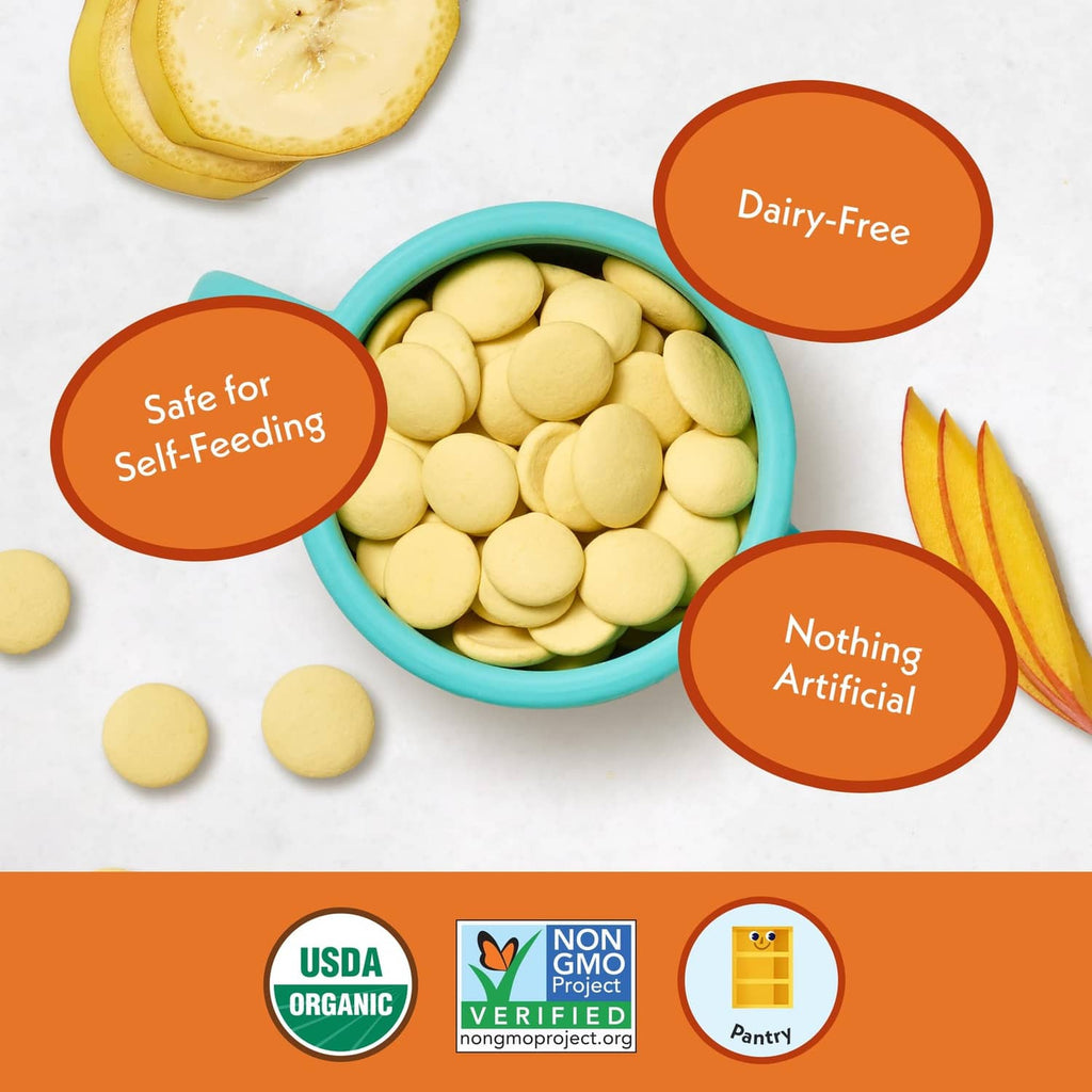Dairy-free organic coconut melts snack pieces, pale yellow rounds in a blue bowl