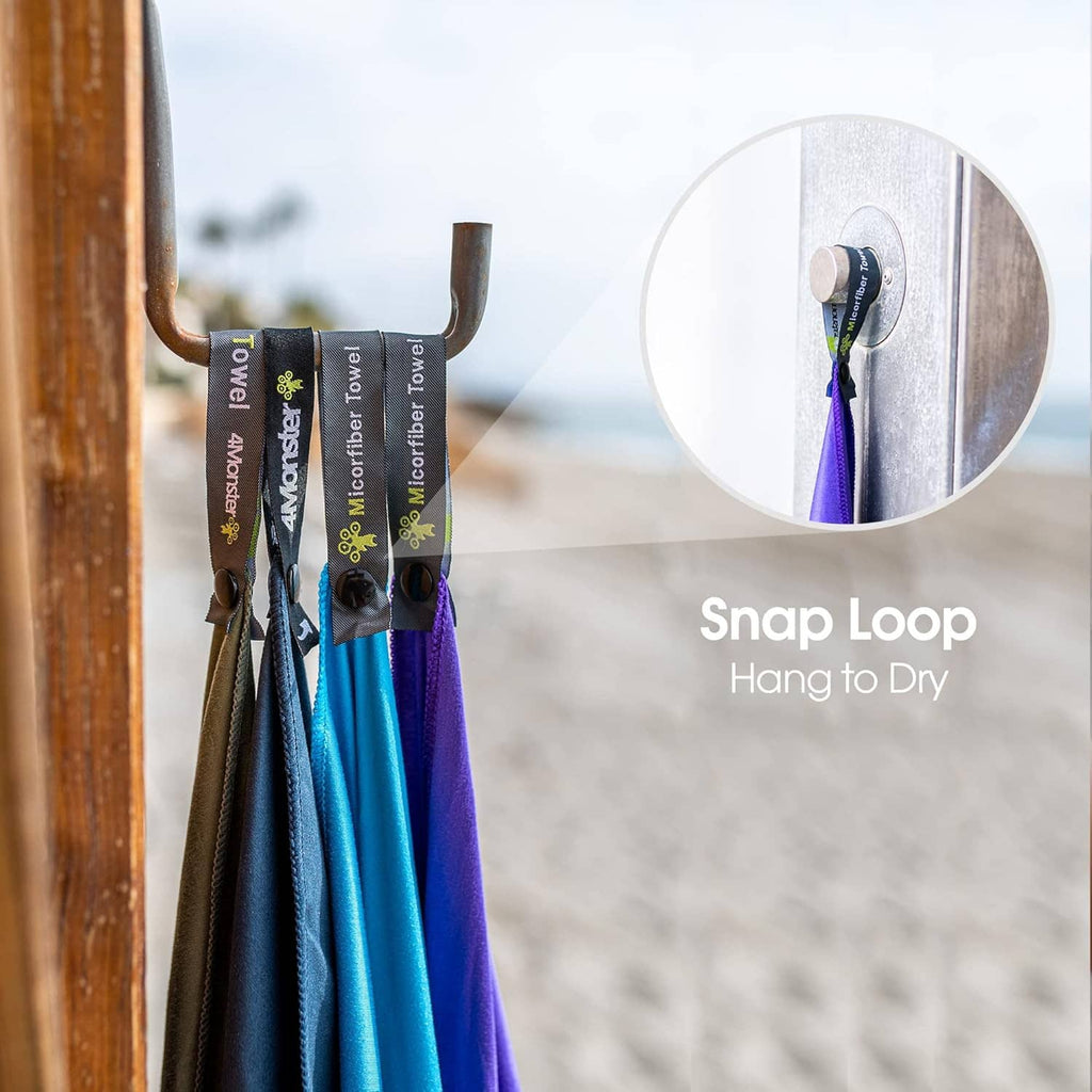 Blue microfiber towel with snap loop hanging from a hook