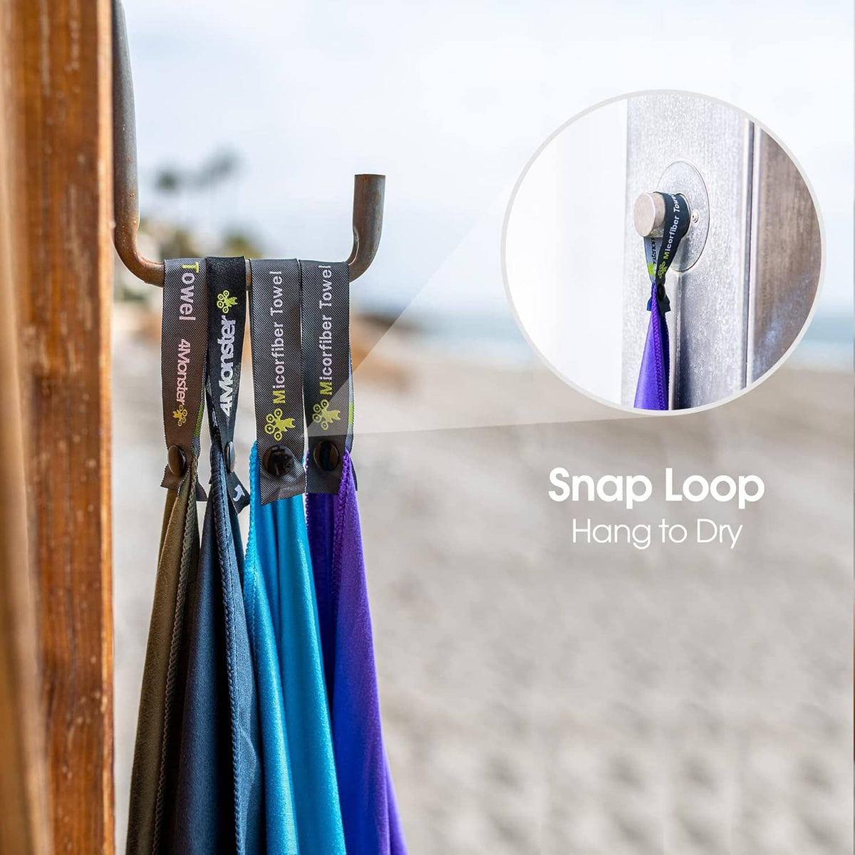 Blue microfiber towel with snap loop hanging from a hook