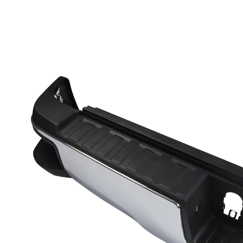 Black and chrome rear step bumper assembly with ribbed step pad and side end cap