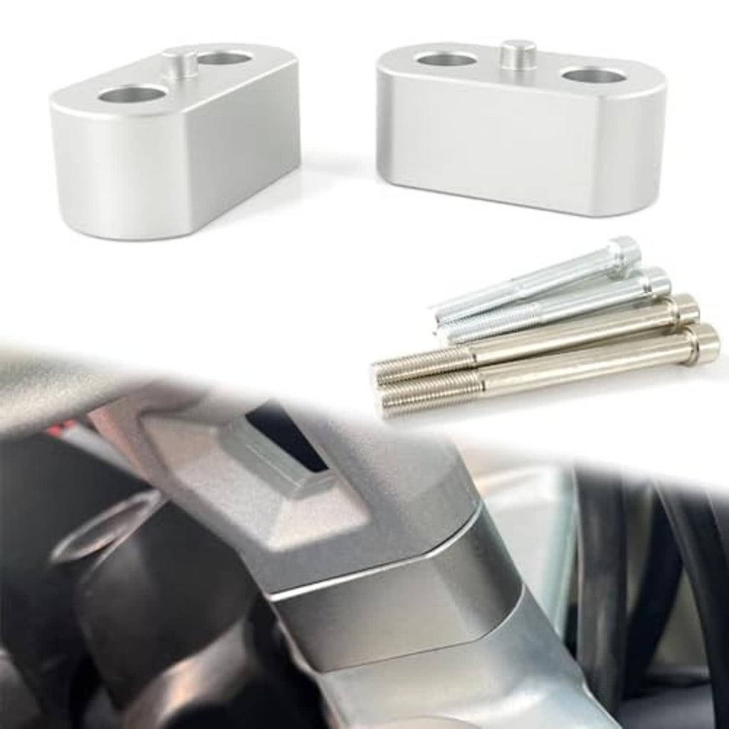 Silver handlebar riser blocks and mounting bolts with installed view