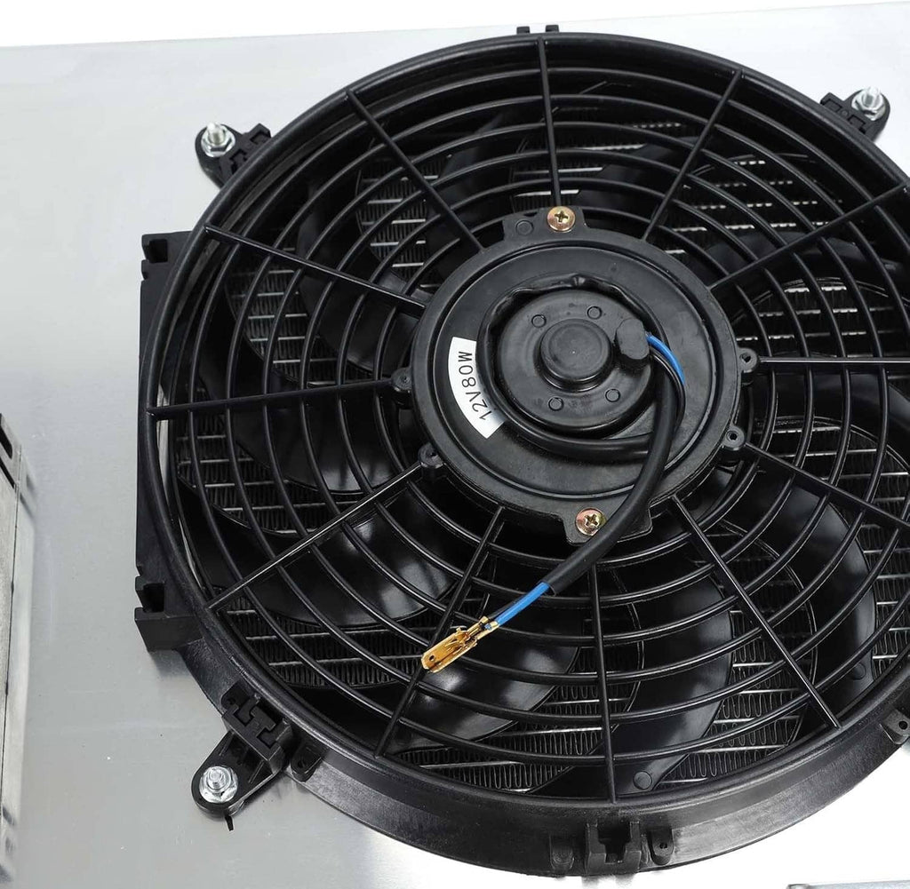 Close-up of black radiator cooling fan with circular motor hub and wiring