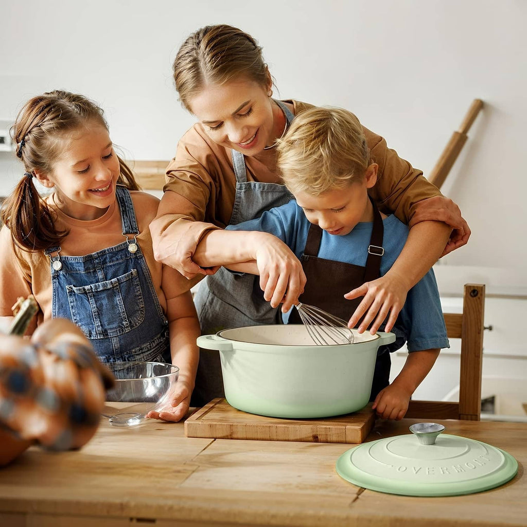 Verdant green enameled Dutch oven on a countertop during meal prep