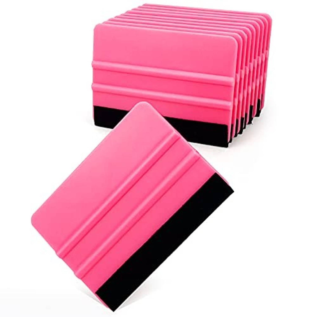 Pink 4-inch vinyl squeegee tool with black felt pad edge, shown at an angle