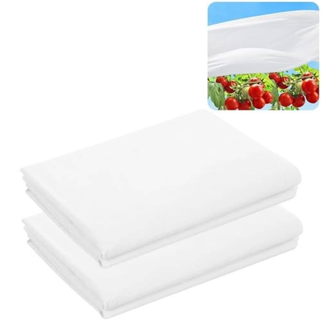 White plant sun protection cloth sheets stacked, smooth translucent fabric
