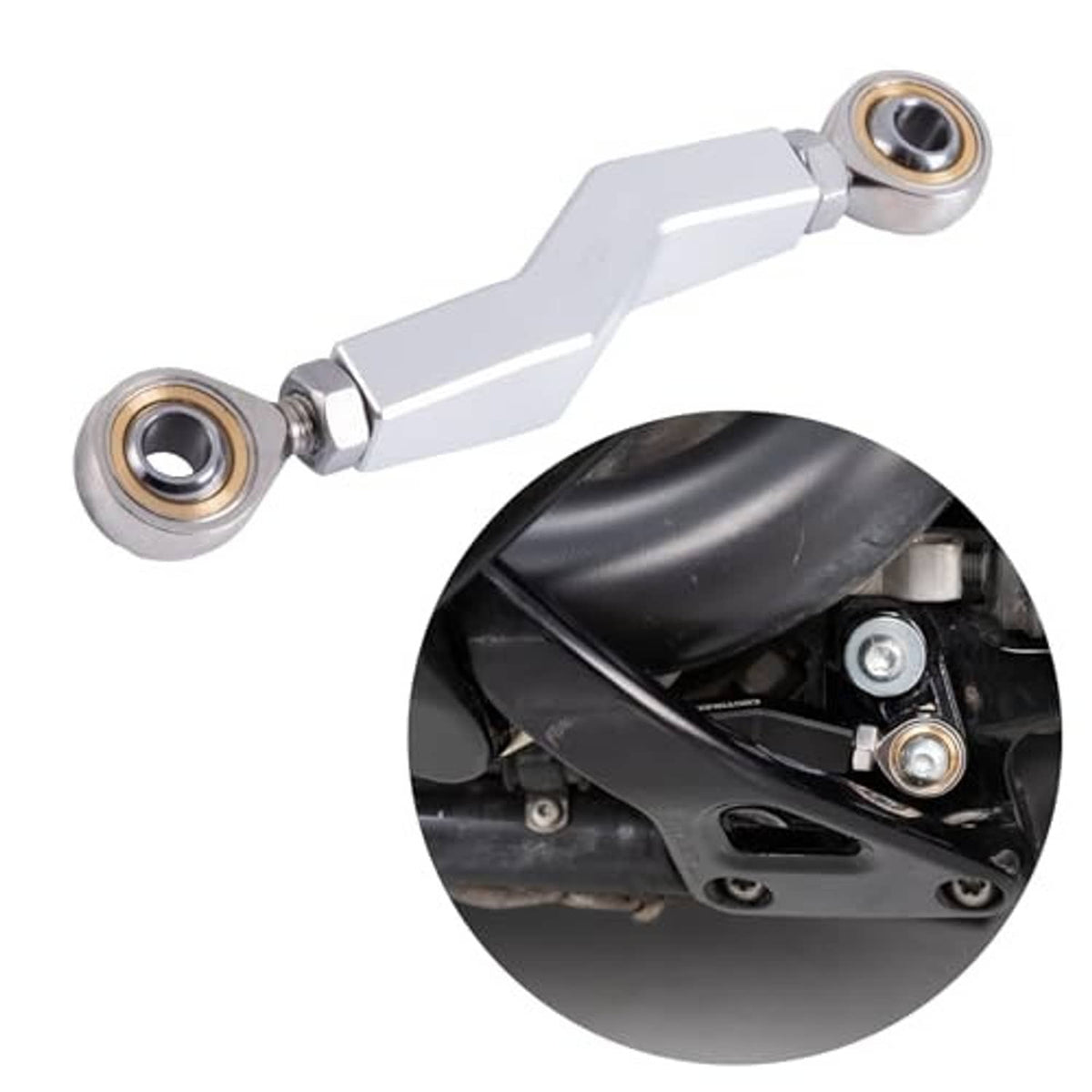Silver rear brake linkage lever with end bearings; close-up of mounting points