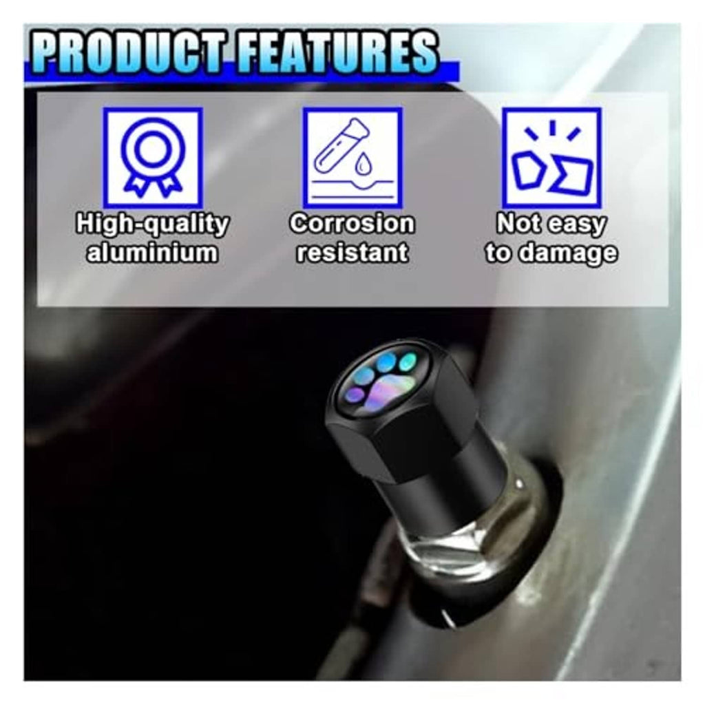 Black tire valve stem cap with glowing paw design fitted on a wheel valve