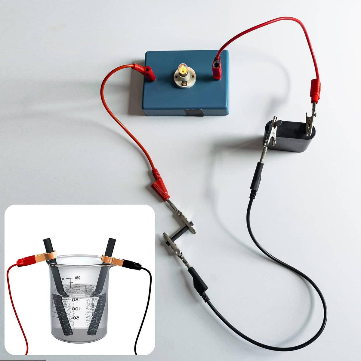 Graphite rods connected in a wiring setup with terminals and leads