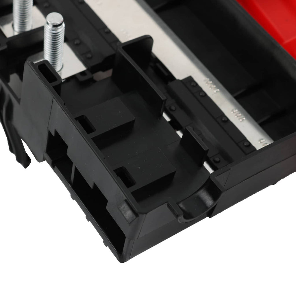 Battery fuse block interior with black plastic channels and metal terminal hardware