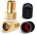 Brass Presta valve adapter with black rubber seal and ridged black cap pieces