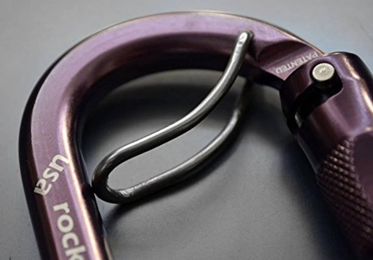 Heavy duty locking carabiner interior view with curved gate, dark purple finish.