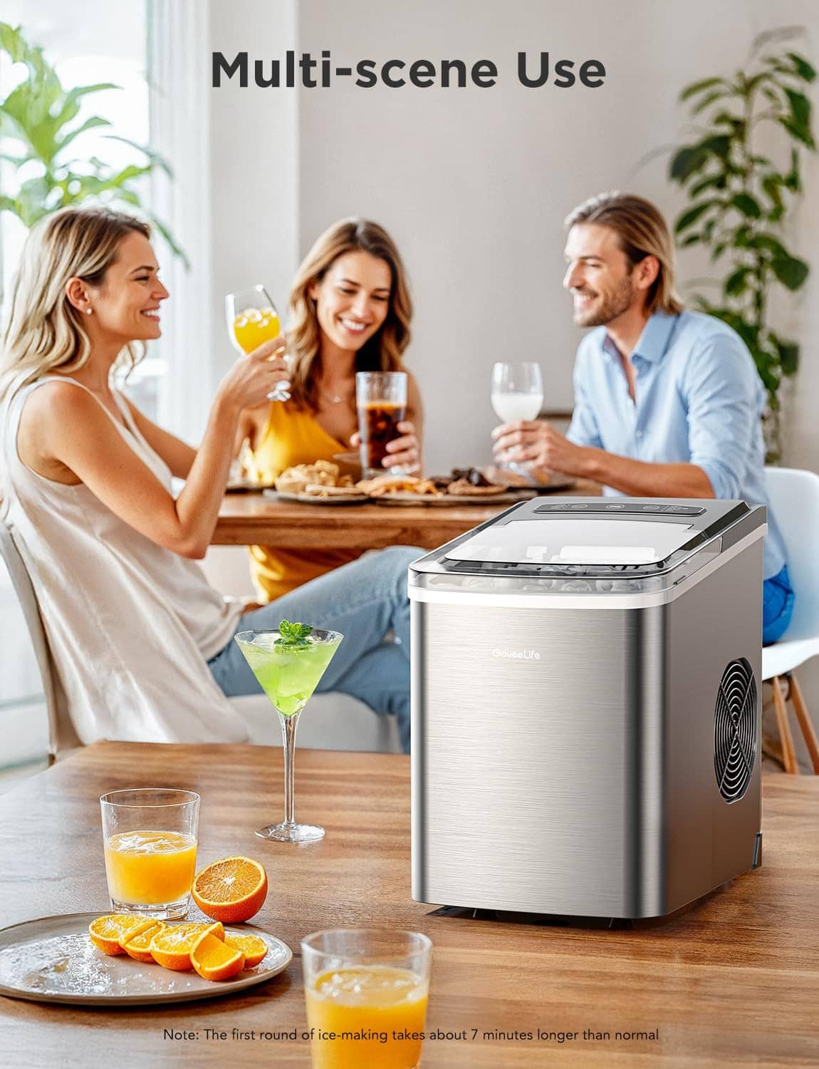 Portable countertop ice maker on table during a family drink gathering
