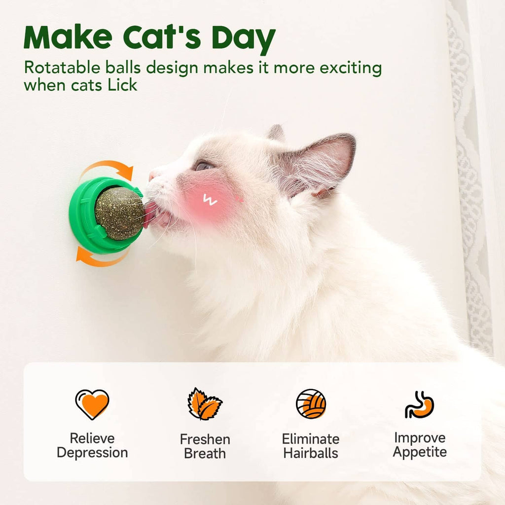 Rotatable catnip toy ball with textured topper in green base