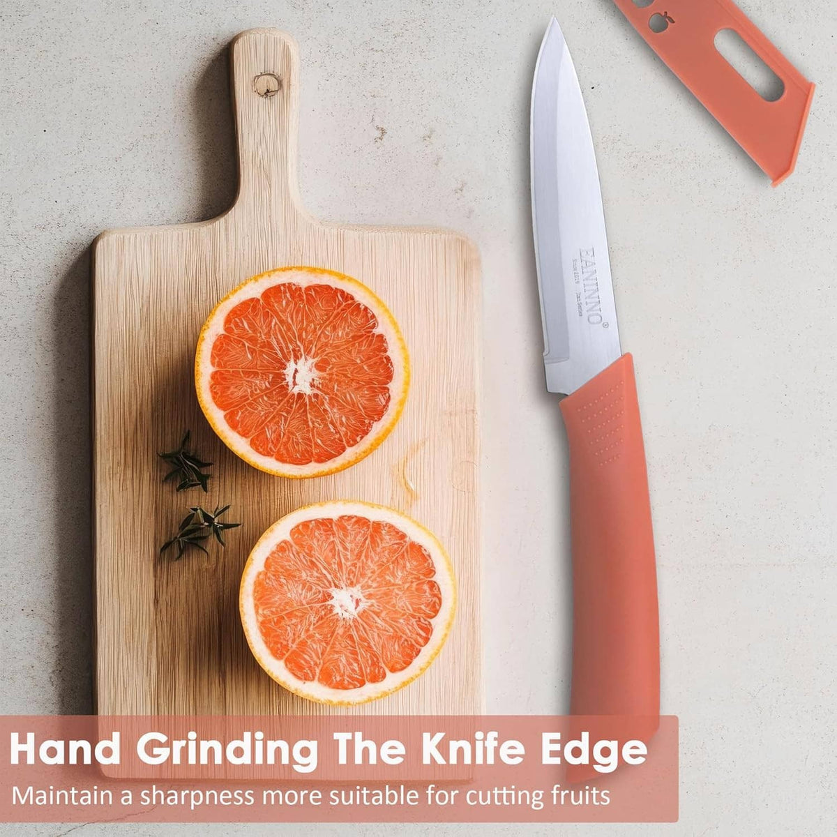 Paring knife with white blade and peach handle beside wooden cutting board