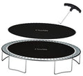 Black round trampoline replacement mat with white spring-guard edge and handle tool