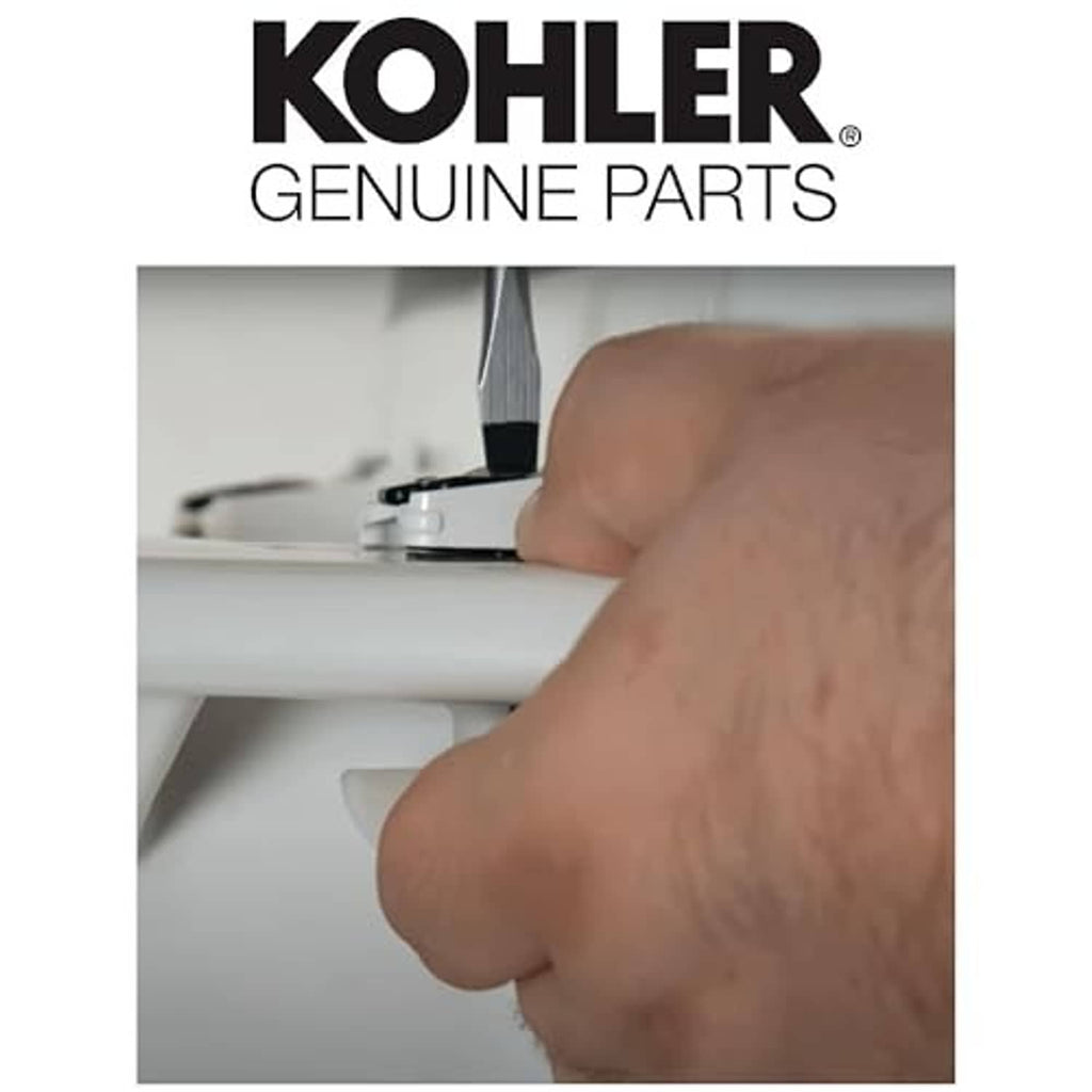 Kohler bumper hardware kit screw tightened with a tool on a white toilet tank
