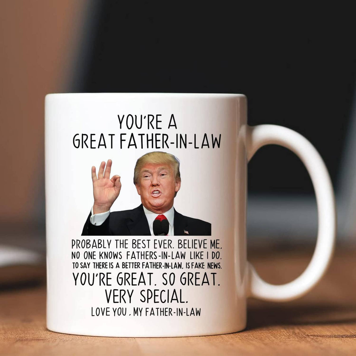 White coffee mug with printed "Great Father-in-Law" text and portrait, side view with handle